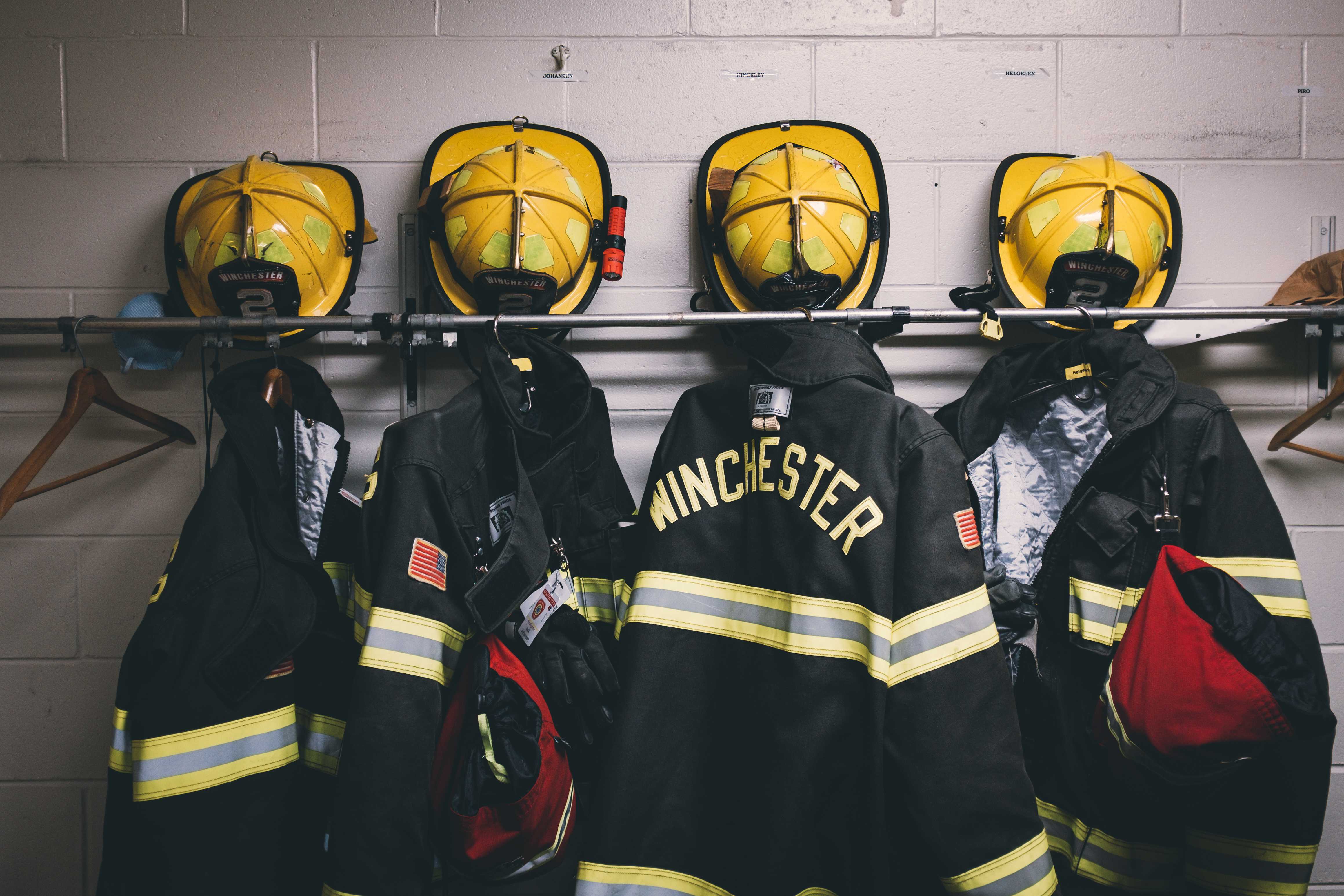 Firefighter turnout gear on a rack