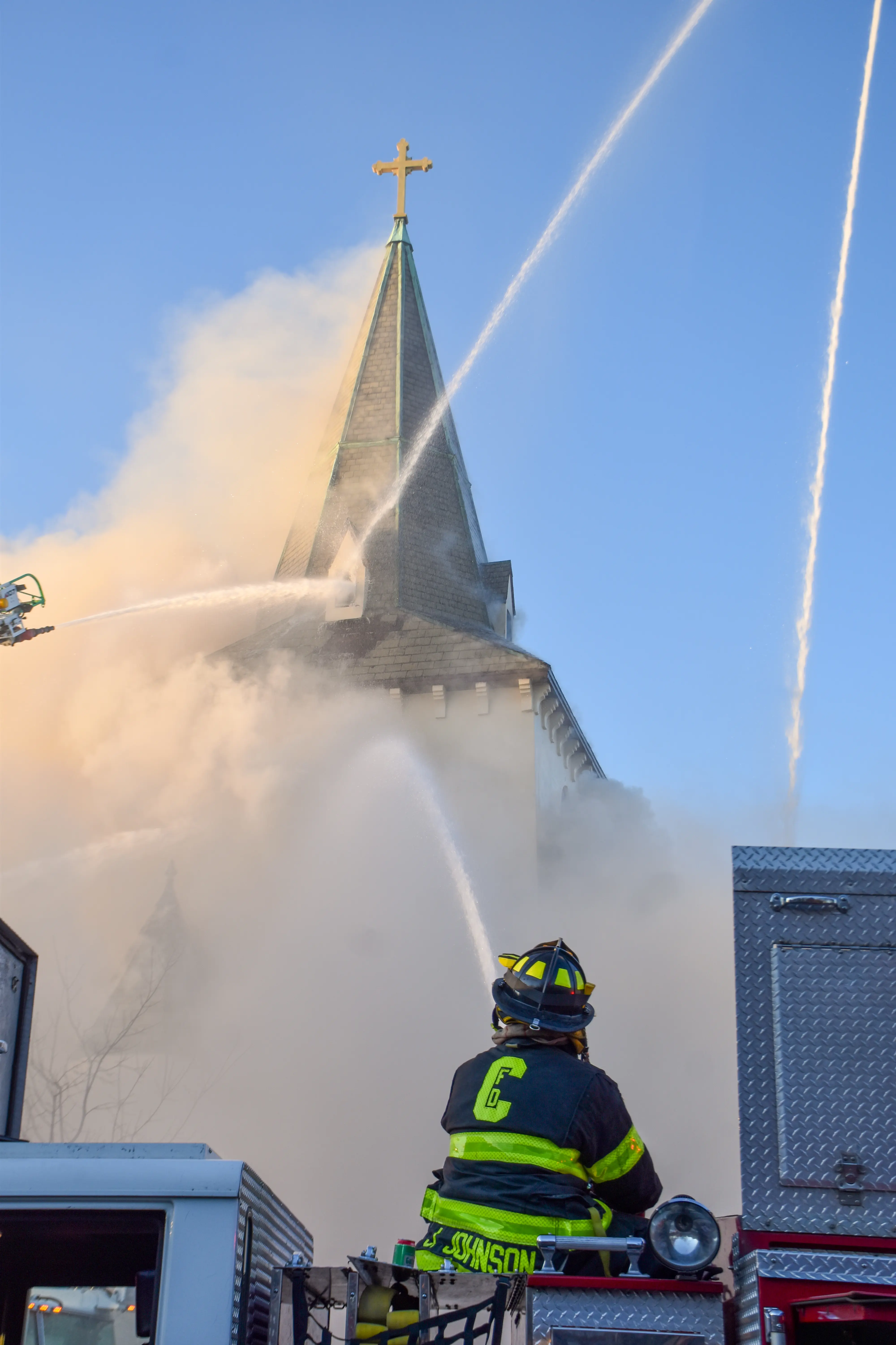 Firefighters operating at a working fire — fire service in action