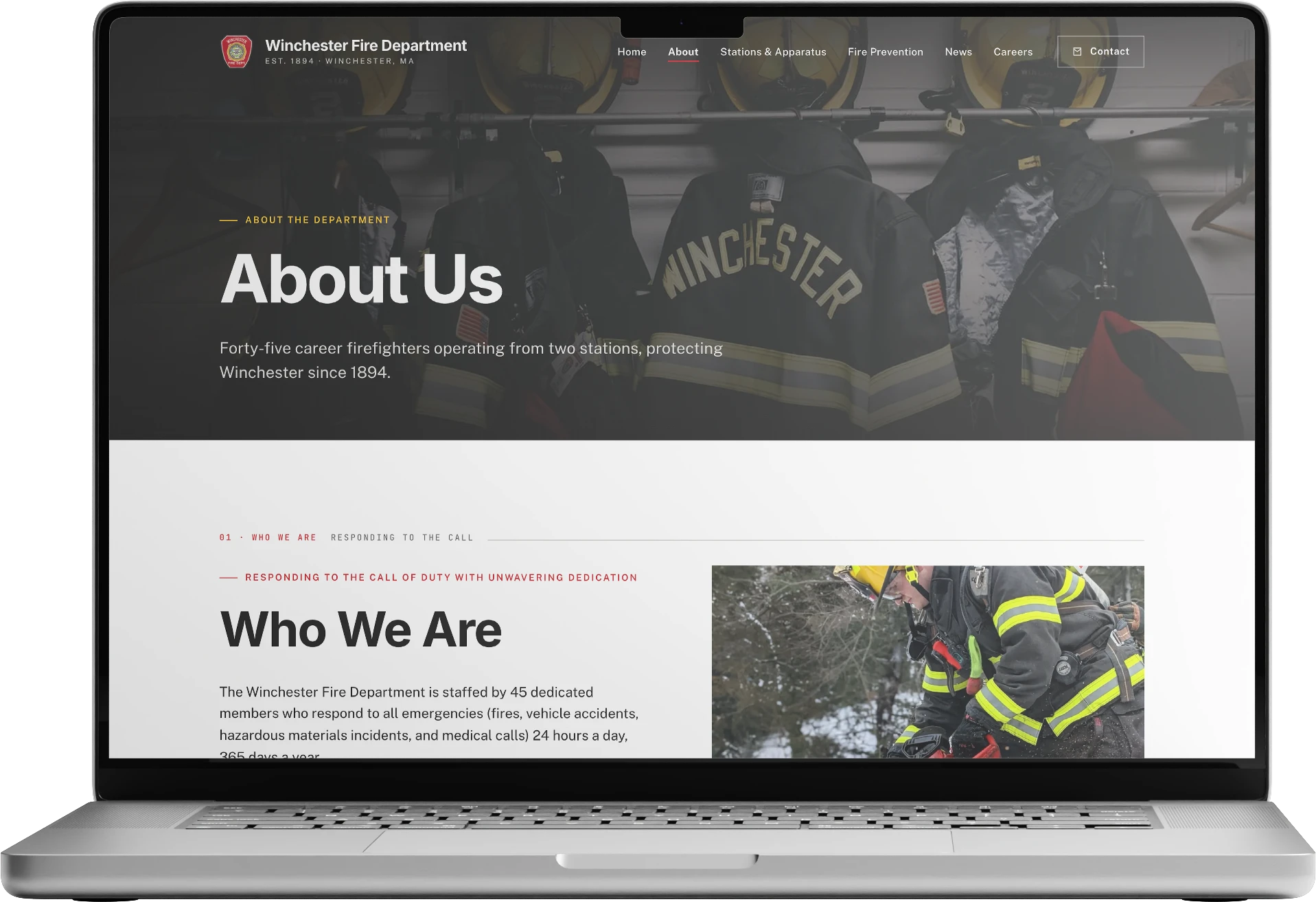 Custom fire department website shown on a MacBook